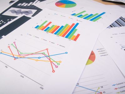 Business report. Graphs and charts. Business reports and pile of documents. Business concept.